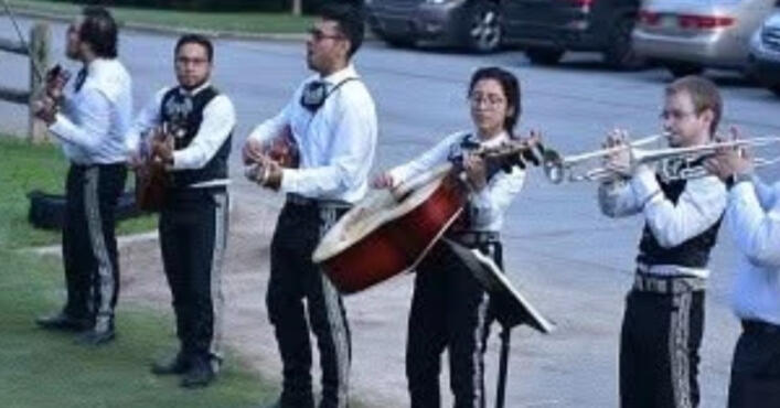 Live mariachi band playing at the event